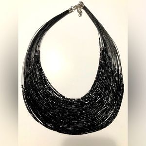 Multistrand black glass necklace